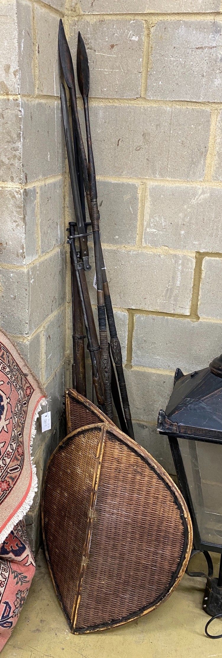 Two composition dummy rifles, two spears and two shields